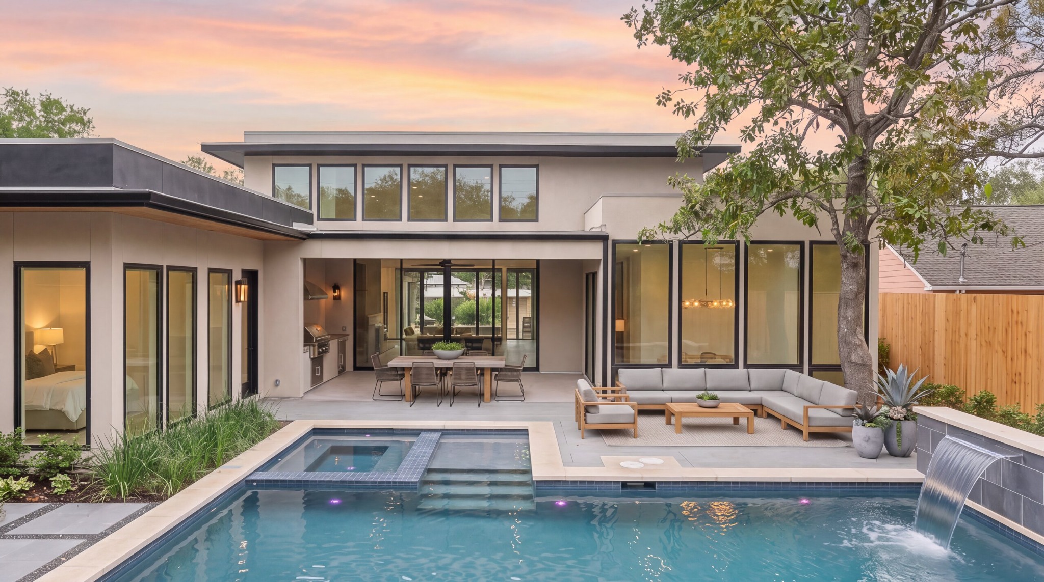 Rivendale Homes modern backyard with a swimming pool, spa, and covered patio